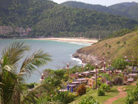 Viewpoint restaurant at Laem Promthep and in the distance is Nai Harn Beach