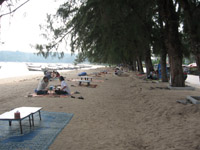 Eating Thai style, sitting on mats on Rawai Beach