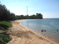 Friendly locals swimming at Sai Kaew Beach