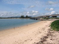 View from Sai Kaew Beach across Sarasin Bridge to the Thai mainland