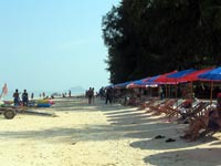 The main beach has deckchairs, jetskis and banana boats