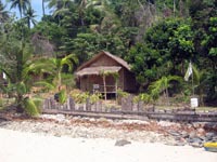 basic, bamboo huts at Coconut Village, very tranquil